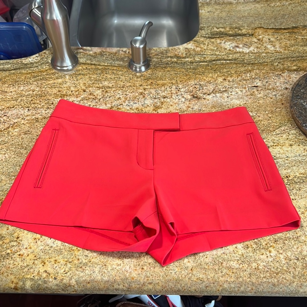 Express pink shorts - polyester. Size 4 brand new, never worn